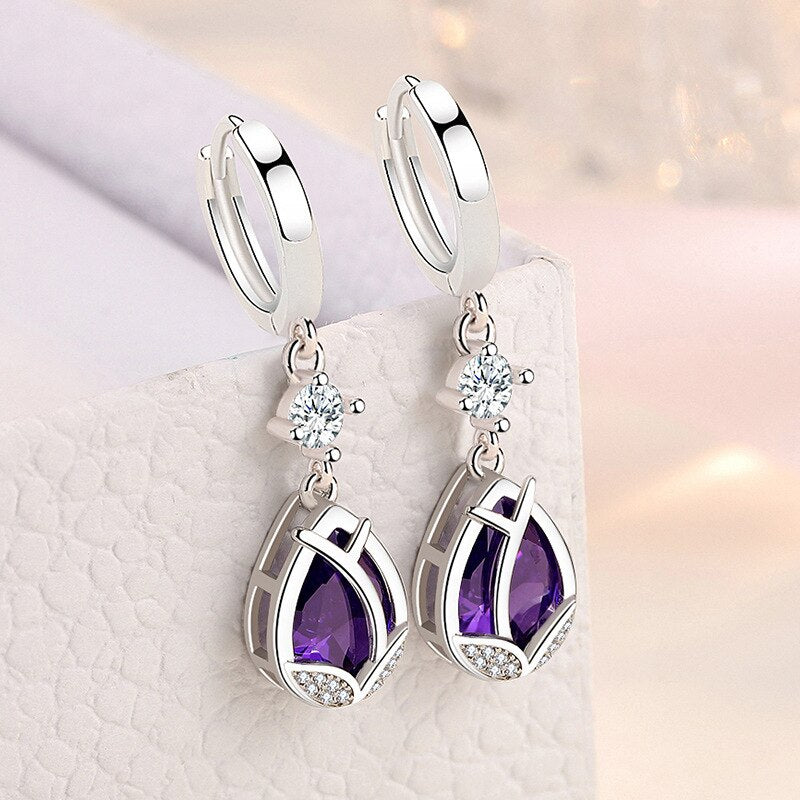 The Needle Vintage Crystal Flower earrings with purple crystal are adorned with beautiful teardrop crystals and sparkling rhinestones. Marking of S925 and a 925 stamp are exquisite and dazzling