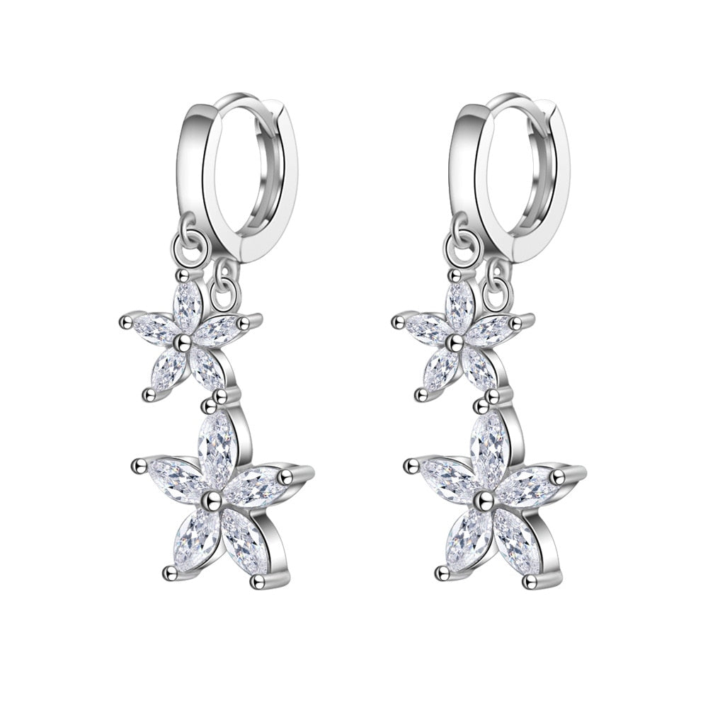 925 Sterling Silver high grade shiny CZ Stones make the earrings shiny. The dangle features water droplets