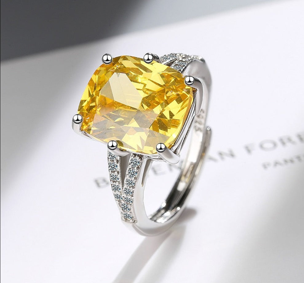 Made with Environmentally White Copper and AAA Cubic Zirconia, the ring is 100% new, high-quality Yellow stone, and marked with the S925 / 925 stamp.